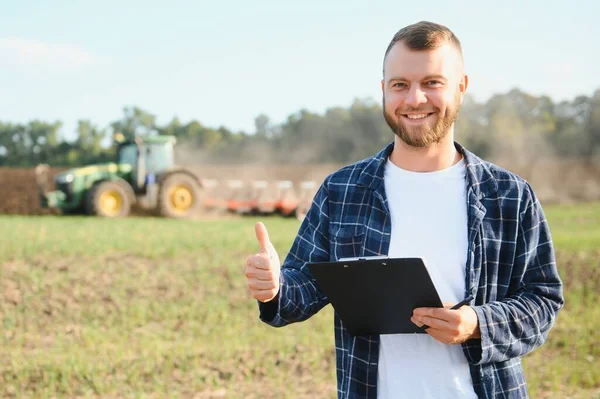 Agriculture Farmer Working Field Background Tractor Plows Ground Field Wheat Stock Image