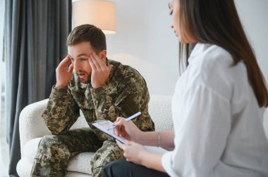 Psychologist supporting military officer in office, closeup