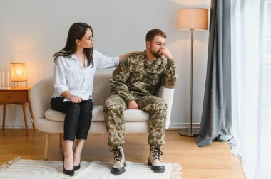Psychologist supporting military officer in office, closeup