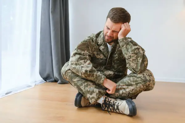 stock image Portrait of middle aged sad, desperate military man. PTSD concept. Horizontal shot.