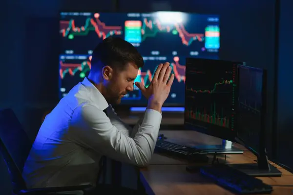 stock image Tired overworked bearded man, crypto trader having headache, lost money.