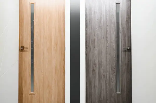 Doors are sold at a hardware store. Choosing doors for the house close-up. Interior renovation concept.