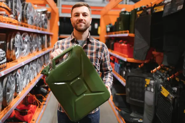 Male Customer Stands Auto Parts Store Jerry Can Stock Image