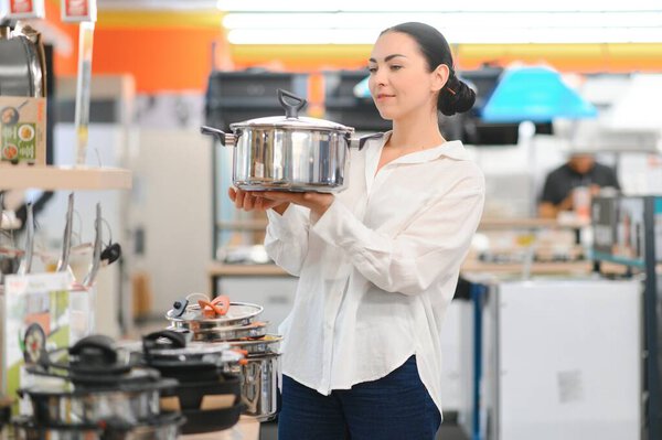Pretty Young Woman Choosing Right Pot Her Cooking Modern Home Stock Picture