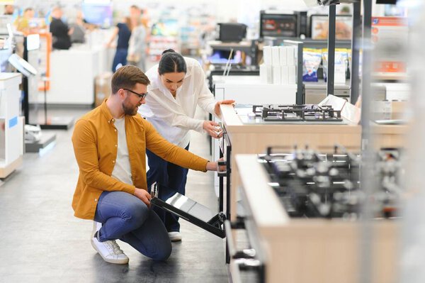 Young Man Woman Buying New Gas Stove Appliances Shop Stock Photo