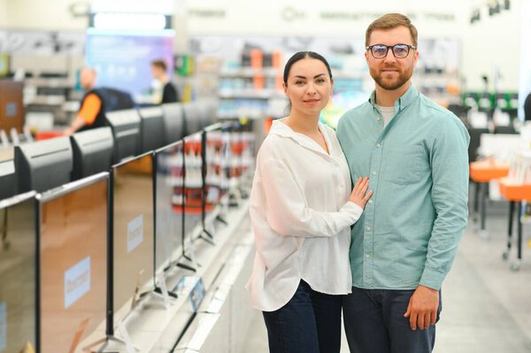 Couple Buying Television Store Royalty Free Stock Images