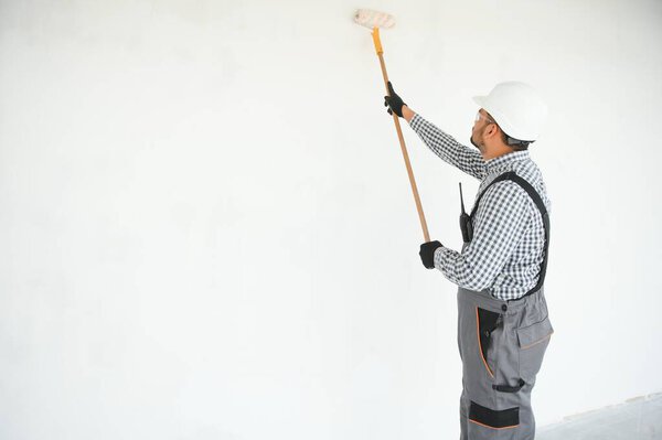 Indian Apartment Repair Worker Paints White Wall Roller Stock Picture