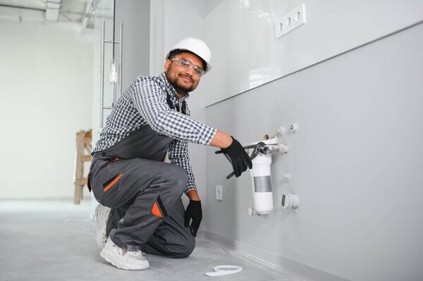 Plumber Installing Water Equipment Meter Filter Pressure Reducer Stock Image