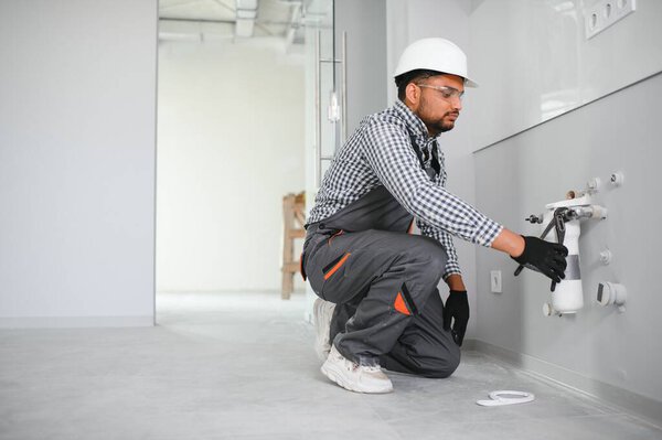 Indian Plumber Installs Change Water Filter Stock Photo