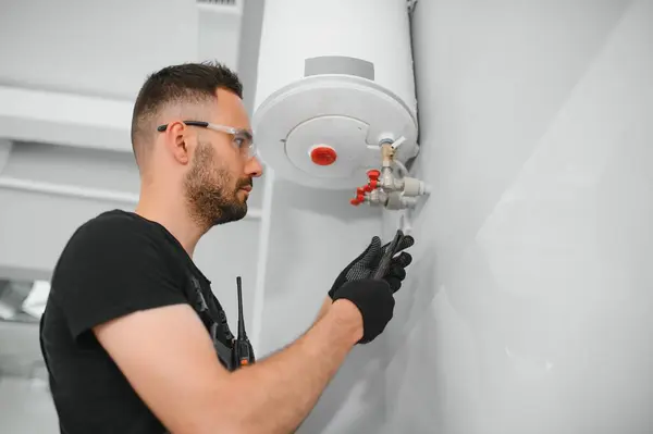 stock image Repair of a gas boiler.