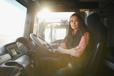 Genç bir kadının portresi. Profesyonel bir kamyon şoförü..