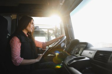 Genç bir kadının portresi. Profesyonel bir kamyon şoförü..