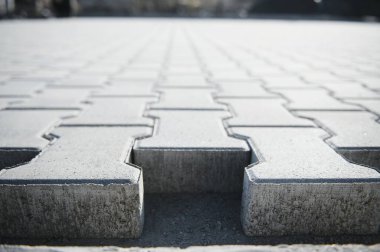 Bakış açısına göre taş kaldırım. Taş kaldırım dokusu. Granit kaldırım taşlı zemin. Bir kaldırım taşının soyut arkaplanı.