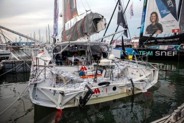 LES SABLES D'OLONNE, FRANCE - NOVEMBER 8, 2024: Isabelle Joschke boat (MACSF) on the Vendee Globe 2024 pontoon on November 8, 2024. in Les Sables d'Olonne, France. clipart