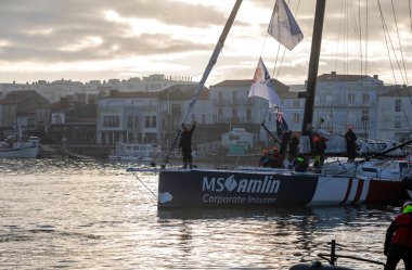 LES SABLES D'OLONNE, FRANCE - FEBRUARY 4, 2025: Arrival of Conrad Colman (MS Amlin) at the twenty-first place of the Vendee Globe 2024 on February 04,2025. in Les Sables d'Olonne, France. clipart