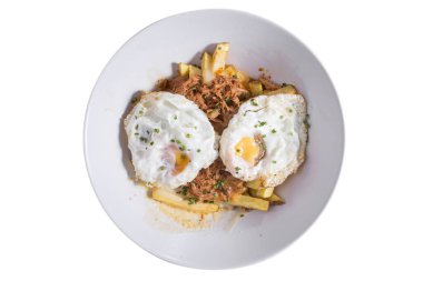 Yumurtanın adı huevos rotos, patates ve serrano jambonlu.