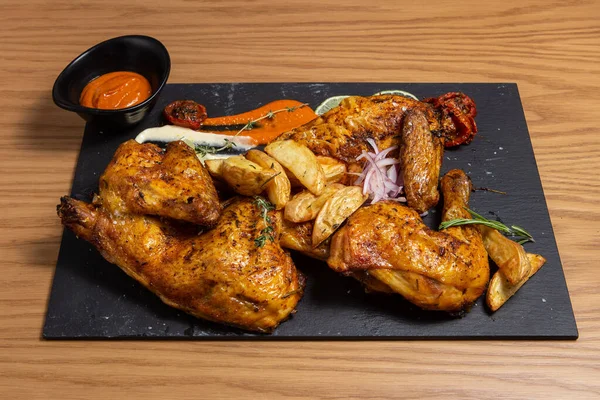 stock image A view of a plate of a pollo asado combo plate