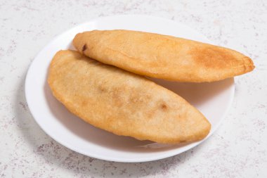 colombian empanadas meat pies on wood background studio shot from above