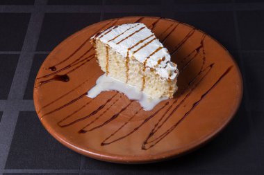 Fresh homemade `tres leches` cake, a traditional latin american dessert with milk