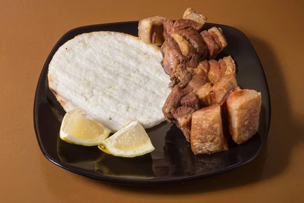 Colombian food, Chicharron fried pork with arepa