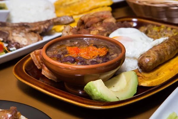 Colombian Bandeja Paisa from above over a restaurante table