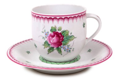 Old vintage tea cup isolated on white background