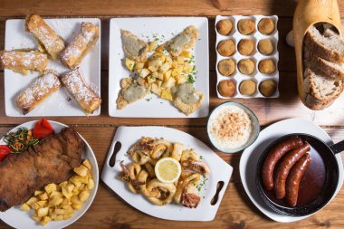 Set of delicious asturian dishes and tapas, top view.
