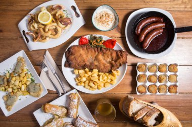 Set of delicious asturian dishes and tapas, top view.