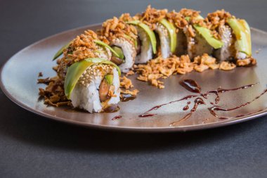 California roll served with aguacate on a plate