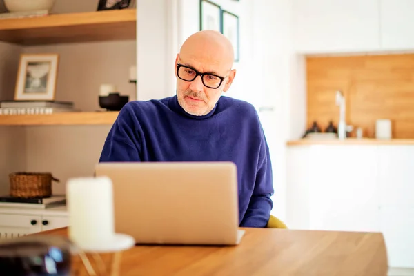 Thinking Middle Aged Man Using Laptop Having Video Call While — Stok fotoğraf