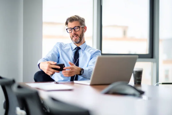 Portrait Businessman Using Smartphone Earphones While Sitting Office Having Video — Stock Photo, Image