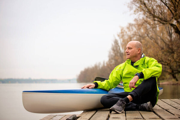 Middle Aged Man Sitting Jetty Ready Kayaking Active Sporty Man Stock Image