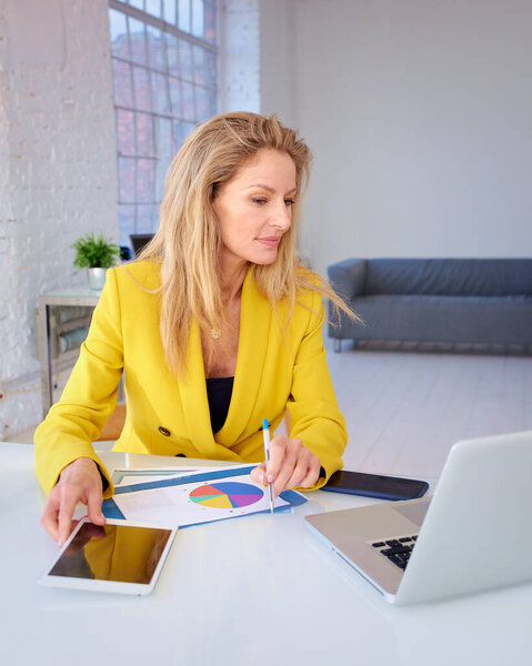 Blond Haired Woman Sitting Office Using Laptop Touchpad Mid Aged Royalty Free Stock Images