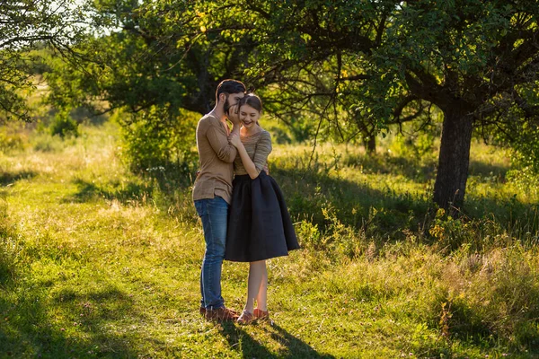 Man Tells His Ear Secret His Girlfriend Walking Park —  Fotos de Stock