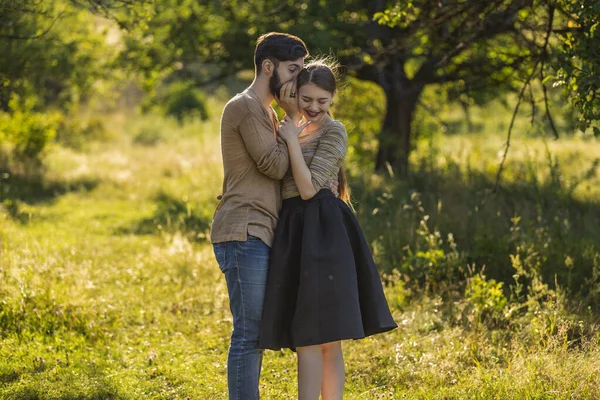 Man Tells His Ear Secret His Girlfriend Walking Park — Stockfoto