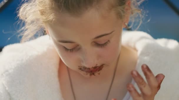 Portrait Girl Who Eats Chocolate Ice Cream Gets Dirty — Stock Video