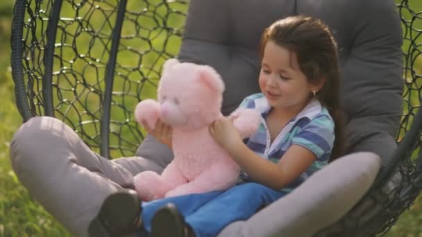 Girl Play Teddy Bear Being Outdoors — Stock Video