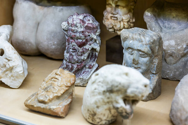 Malaga, Spain - October 21, 2023: Various mixed ceramic artifacts on Malaga museum, Spain.