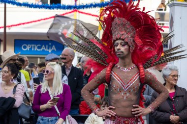 LOULE, PORTUGAL - 17th FEB 2024: Colorful Carnival (Carnaval) Parade festival participants on Loule city, Portugal. clipart