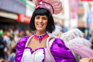 LOULE, PORTUGAL - 17th FEB 2024: Colorful Carnival (Carnaval) Parade festival participants on Loule city, Portugal. clipart