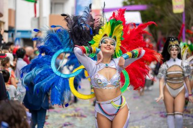 LOULE, PORTUGAL - 17th FEB 2024: Colorful Carnival (Carnaval) Parade festival participants on Loule city, Portugal. clipart