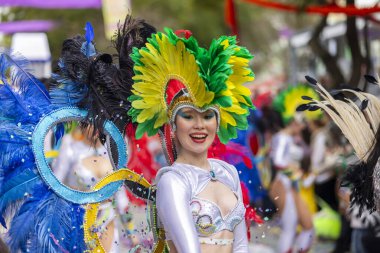 LOULE, PORTUGAL - 17th FEB 2024: Colorful Carnival (Carnaval) Parade festival participants on Loule city, Portugal. clipart