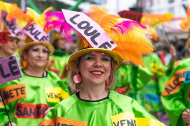 LOULE, PORTUGAL - 17th FEB 2024: Colorful Carnival (Carnaval) Parade festival participants on Loule city, Portugal. clipart