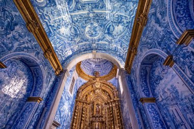 ALMANCIL, PORTUGAL - 26th MARCH 2024: Interior view of the beautiful azulejo church Sao Lourenco in Almancil. clipart