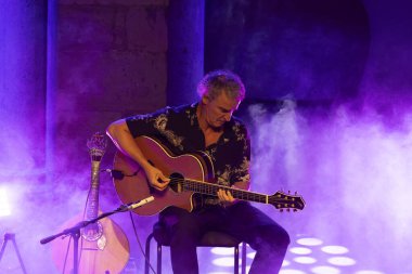 FARO, PORTUGAL: 5th SEPTEMBER, 2024 - Music artist, Amar Guitarra, performs on Festival F, a big festival on the city of Faro, Portugal. clipart