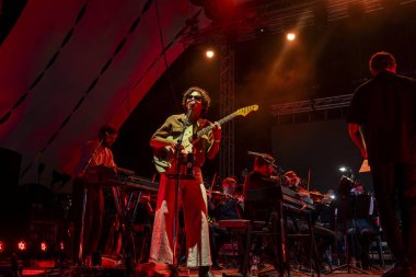 FARO, PORTUGAL: 6th SEPTEMBER, 2024 - Music artist, Capitao Fausto and Orquestra do Algarve, performs on Festival F, a big festival on the city of Faro, Portugal. clipart