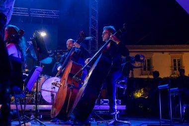 FARO, PORTUGAL: 6th SEPTEMBER, 2024 - Music artist, Capitao Fausto and Orquestra do Algarve, performs on Festival F, a big festival on the city of Faro, Portugal. clipart