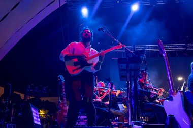 FARO, PORTUGAL: 6th SEPTEMBER, 2024 - Music artist, Capitao Fausto and Orquestra do Algarve, performs on Festival F, a big festival on the city of Faro, Portugal. clipart