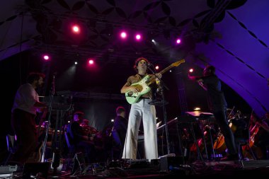 FARO, PORTUGAL: 6th SEPTEMBER, 2024 - Music artist, Capitao Fausto and Orquestra do Algarve, performs on Festival F, a big festival on the city of Faro, Portugal. clipart