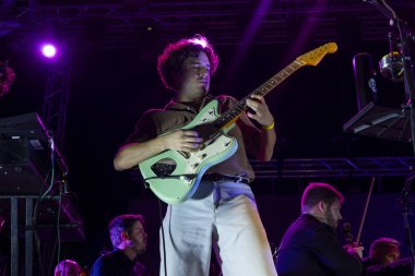 FARO, PORTUGAL: 6th SEPTEMBER, 2024 - Music artist, Capitao Fausto and Orquestra do Algarve, performs on Festival F, a big festival on the city of Faro, Portugal. clipart